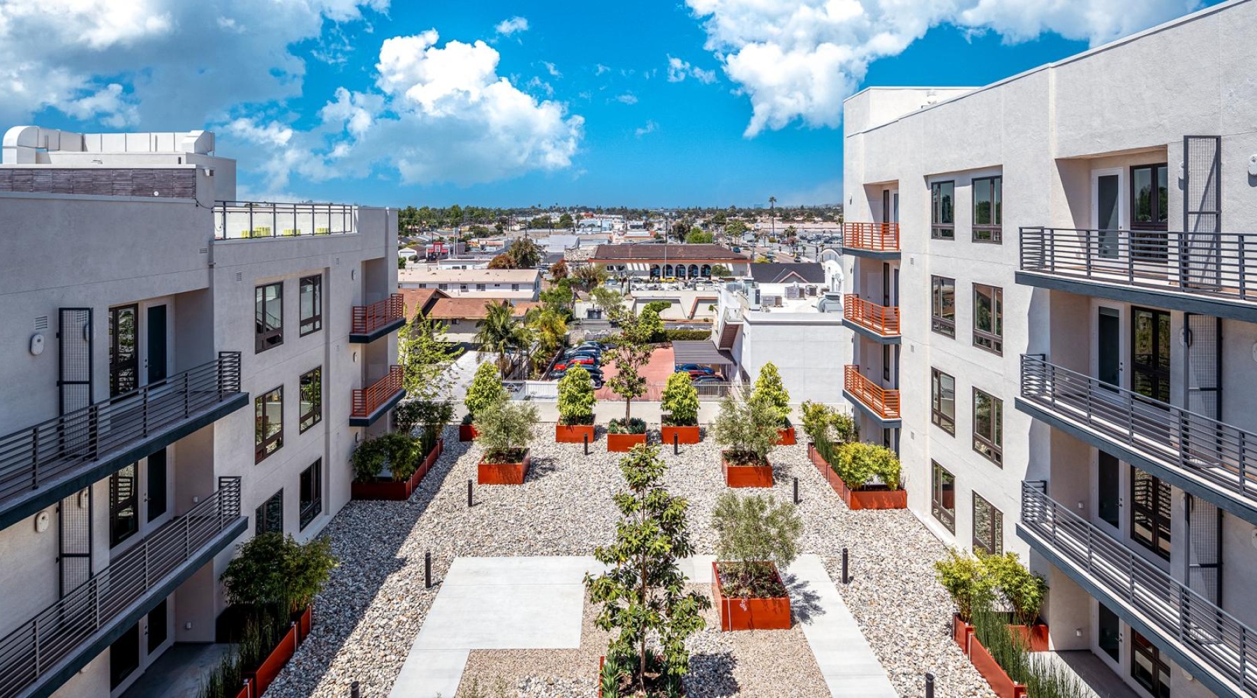 Settle into comfort at Province a courtyard between buildings